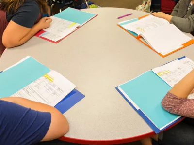 Overhead view of several papers on a desk
